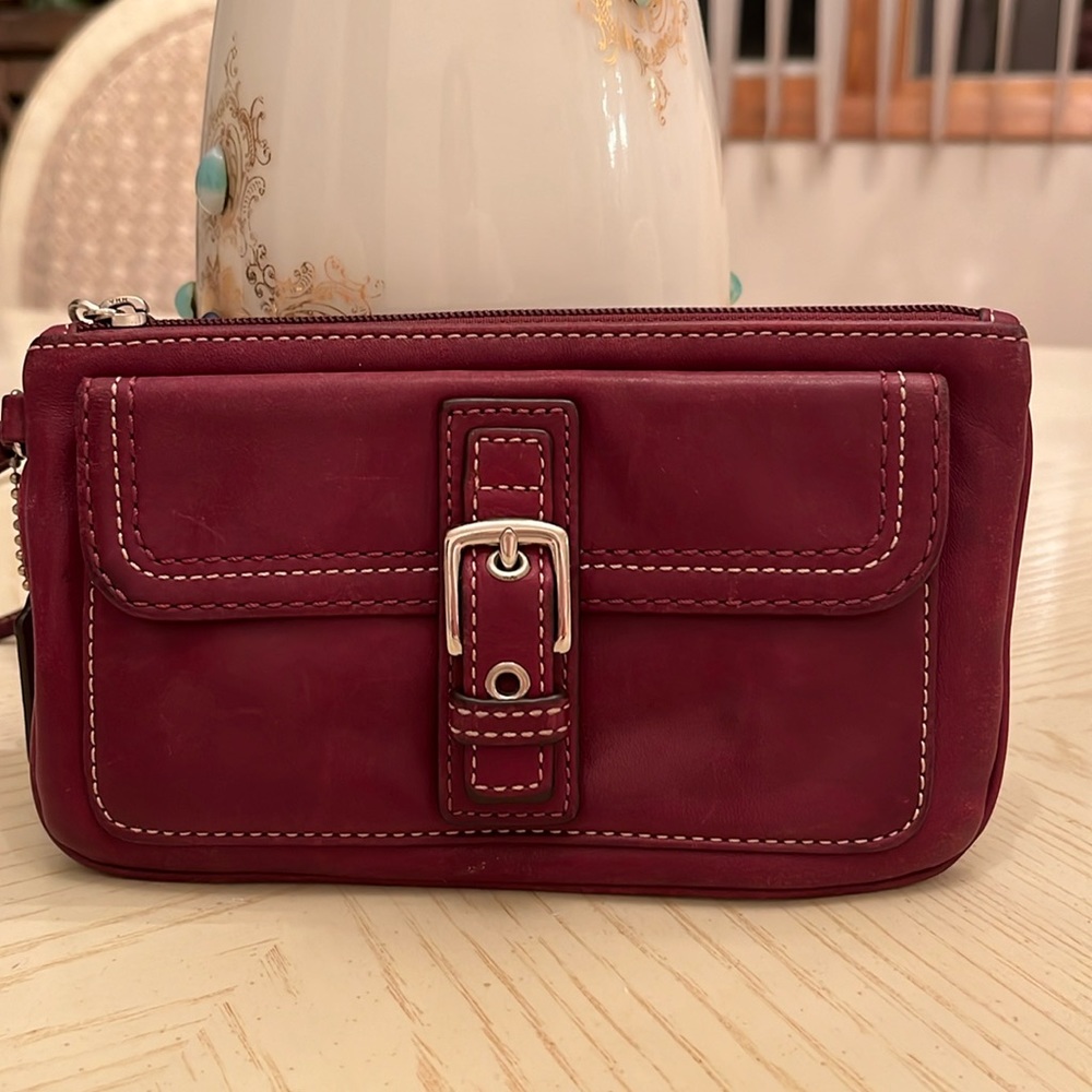 Coach like new zip top wristlet